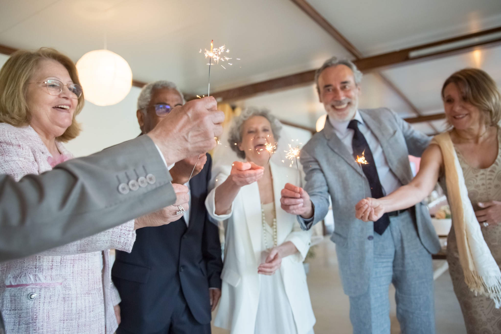 Guests celebrating together with sparklers